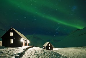 cabins under the aurora borealis