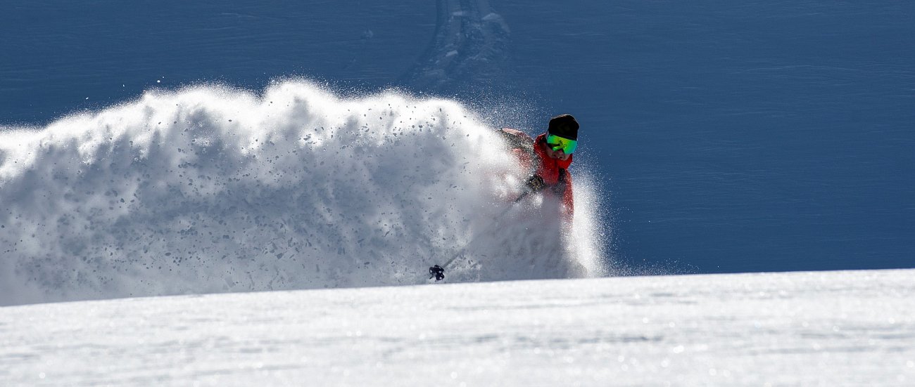 How much does heliskiing cost (and will it guarantee me powder)?